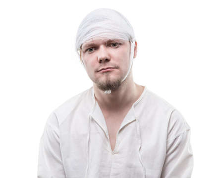 Young patient with bandaged headの写真素材