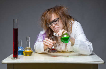 Mixing messy chemist in labの写真素材