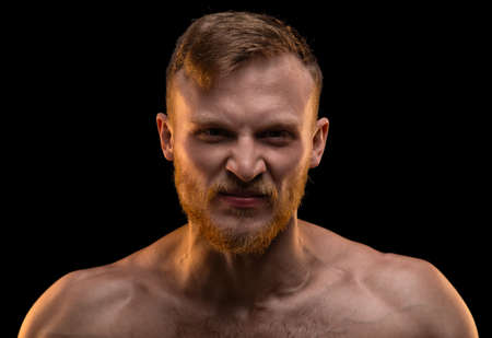 Angy man with naked shouldersの写真素材