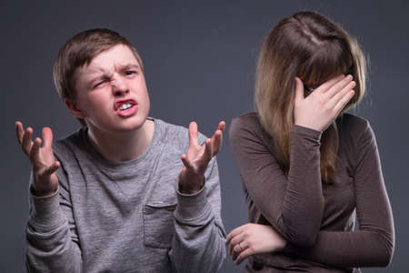 Shame young woman and manの写真素材