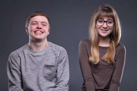 Portrait of happy teenage coupleの写真素材