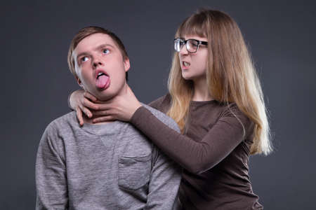 Man-hater young woman and manの写真素材