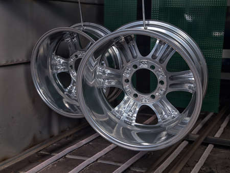 Powder coating and drying of metal auto disksの写真素材