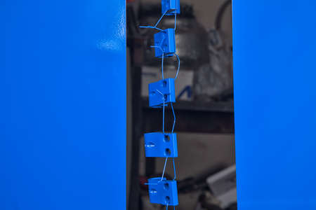 Powder painting and drying of metal itemsの写真素材