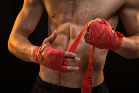 Man with red boxing bandagesの写真素材