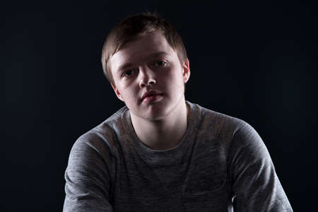 Portrait of smiling teenager guy
