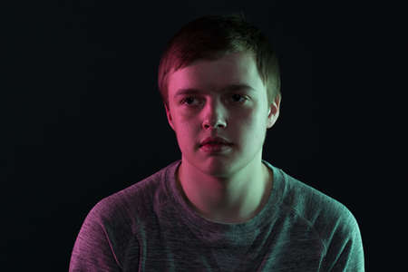 Portrait of looking to the side guyの写真素材