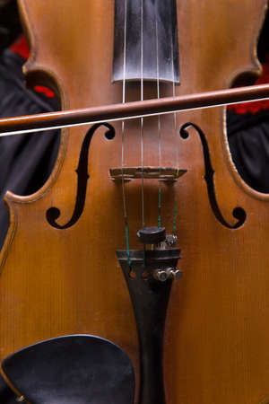 Photo of violin and fiddlestick, closeupの写真素材