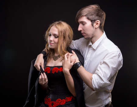 Caring young man and his beloved womanの写真素材