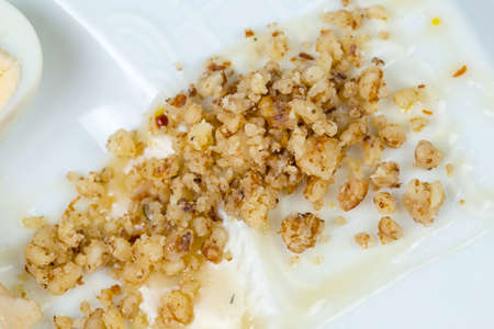 Crushed walnuts with sauceの写真素材