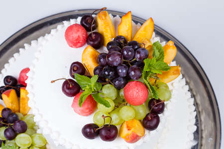 Decoration different fruits sweet cakeの写真素材
