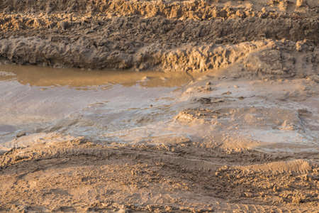 Texture of muddy road after rain