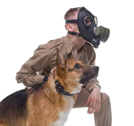 Cynologist in gas mask with  isolated on whiteの写真素材