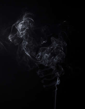 Smoky swirl of smoldering aromastickの写真素材