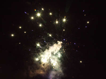 Image of bright colorful salute in the black sky