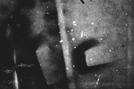 Photo of old scratched dark surface textureの写真素材