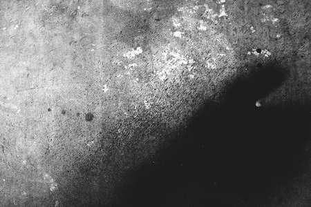 Photo of old scratched surface texture in black and white
