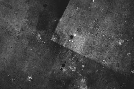 Photo of old scratched surface texture in black and white colors