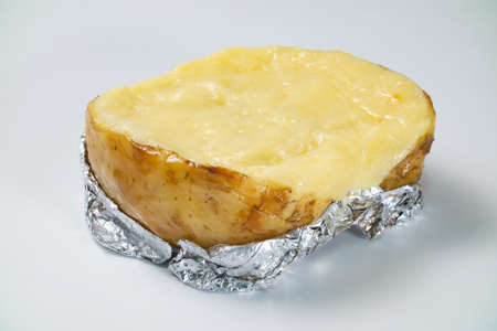 Image of fresh baked potato with cheeseの写真素材