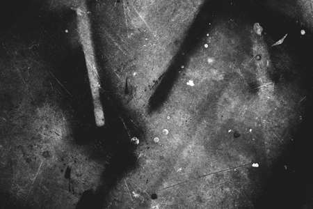 Photo of old scratched surface texture in black and white colors