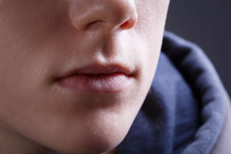 Photo of young girls lips without make-upの写真素材
