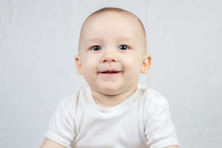 Close-up image of a sitting eight month old babyの写真素材