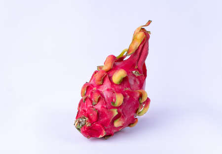 Ripe fresh dragon fruit on white background