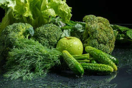 Photo of green wet vegetable set with appleの写真素材