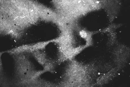 Photo of scratched surface texture in black and white colorsの写真素材
