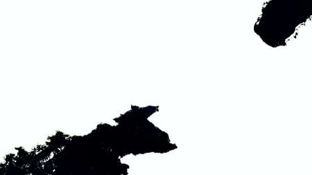 Photo of black paint spreads on white surfaceの写真素材