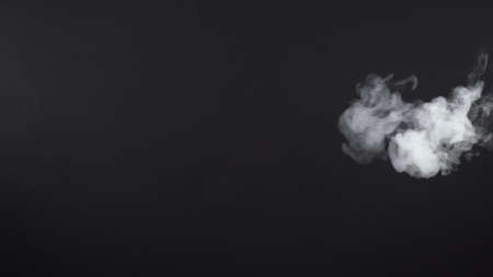 Shooting of cigarette cloudy smoke on black background