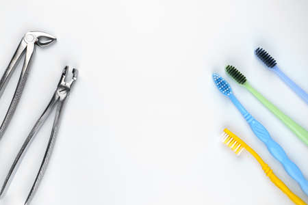 Two dental tools with toothbrushes on isolated white backgroundの写真素材