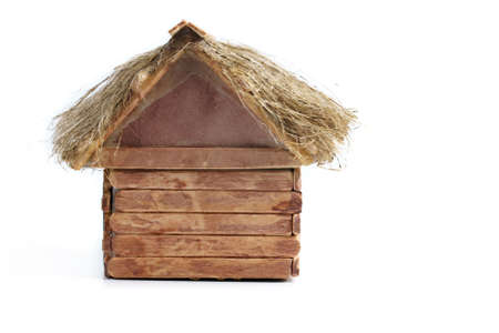 Image of handmade wooden house - souvenir on white backgroundの写真素材
