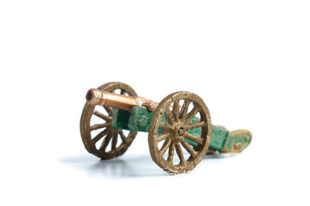Handmade tin cannon on the white background