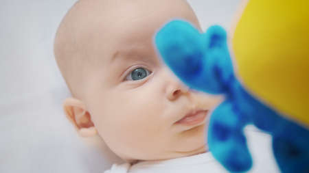 Photo of surprised baby four month girlの写真素材