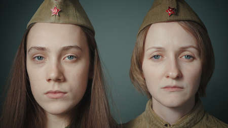 Photo of young women in soviet red army uniformの写真素材