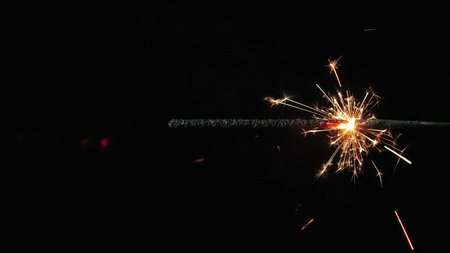 Shot of the burning bengal candle on blackの写真素材