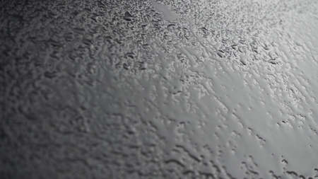 Shooting of spray drops on black backgroundの写真素材