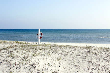 a lifebuoy ring on a beach on Denmark Langelandの写真素材