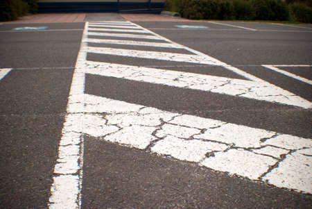 painted white lines at a school carport for safe school crossingの写真素材
