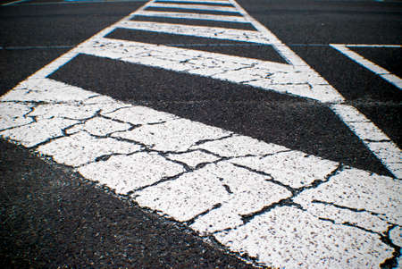 painted white lines at a school carport for safe school crossingの写真素材