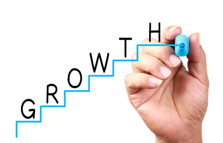Growth Stairs drawn on transparent whiteboard.の写真素材