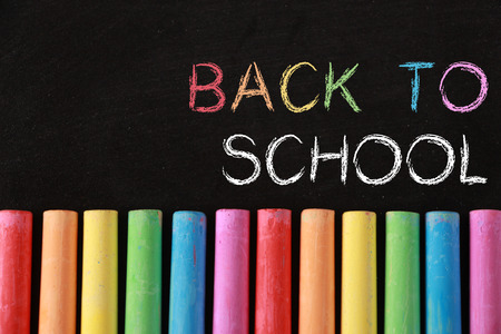 Back to school Background with some colourful chalk.の写真素材