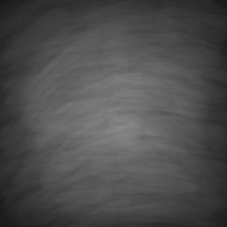 Blank blackboard with chalk traces for background image.の写真素材