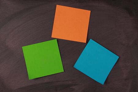 Blank notes pasted on blackboard which can be background for you text or drawing.