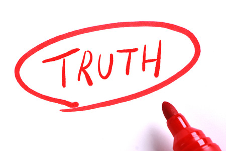 Truth in circle with red marker on white paper.