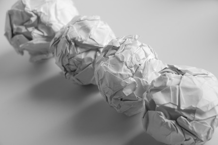 White paper balls are on the white background.の写真素材