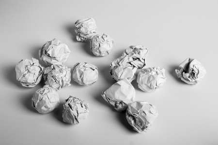 White paper balls are on the white background.の写真素材