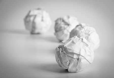 White paper balls are on the white background.の写真素材