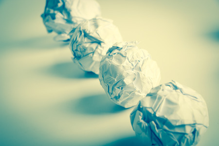 White paper balls are on the blank background.の写真素材